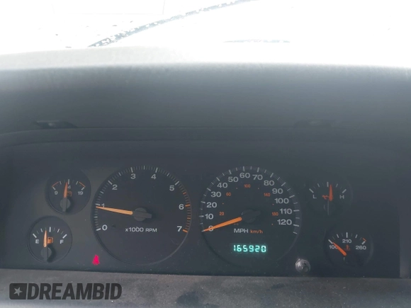 2003 Jeep Grand Cherokee Laredo with VIN 1J4GW48NX3C532874, listed as a IAAI auction lot 42613091 with 165,920 mi miles and . Bid and sale history available at DreamBid. Image 7.