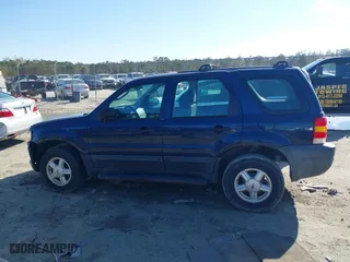 2003 Ford Escape XLS Popular with VIN 1FMYU02133KA02990, listed as a IAAI auction lot 41803174 with 140,792 mi miles. Bid and sale history available at carsss.com. Image 13.