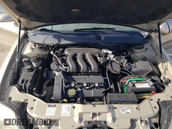 2000 Mercury Sable LS Premium z VIN 1MEFM55S0YA621927, wystawiony jako Copart lot #87052444 z przebiegiem 34 930 mil mil oraz Szkoda całkowita • Salvage title. Historia ofert i sprzedaży dostępna na DreamBid. Obrazek 13.