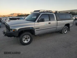 2000 Dodge Ram 2500 with VIN 1B7KF2369YJ144753, listed as a Copart auction lot 80801414 with 173,413 mi miles and Salvage Title. Bid and sale history available at carsss.com. Image 1.
