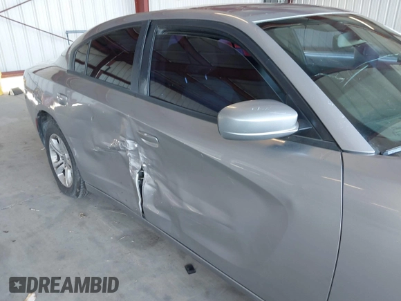 2015 Dodge Charger SE with VIN 2C3CDXBG1FH840060, listed as a IAAI auction lot 42111676 with 165,479 mi miles and . Bid and sale history available at carsss.com. Image 6.