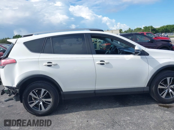 2018 Toyota RAV4 XLE with VIN JTMWFREV4JJ753365, listed as a IAAI auction lot 42550177 with 42,607 mi miles and . Bid and sale history available at DreamBid. Image 14.