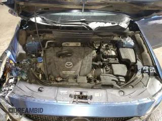2018 Mazda CX-5 Grand Touring with VIN JM3KFBDM1J0304706, listed as a Copart auction lot 46123415 with 104,004 mi miles and Salvage title. Bid and sale history available at DreamBid. Image 12.