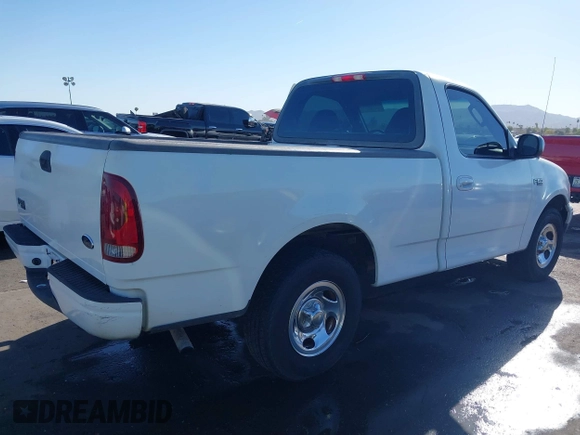 2003 Ford F-150 XL with VIN 1FTRF17293NA46808, listed as a IAAI auction lot 41156923 with 384,475 mi miles and . Bid and sale history available at DreamBid. Image 4.