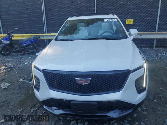 2024 Cadillac XT4 AWD Sport with VIN 1GYFZFR44RF195386, listed as a Copart auction lot 74949924 with 2,693 mi miles and Salvage title. Bid and sale history available at DreamBid. Image 5.