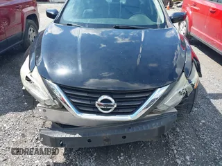 2016 Nissan Altima SR with VIN 1N4AL3APXGC199128, listed as a IAAI auction lot 42002359 with 202,852 mi miles and . Bid and sale history available at DreamBid. Image 6.