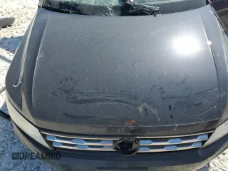 2018 Volkswagen Tiguan S z VIN 3VV1B7AX6JM147216, wystawiony jako Copart lot #52449345 z przebiegiem Nie podano mil oraz Szkoda całkowita • Salvage title. Historia ofert i sprzedaży dostępna na DreamBid. Obrazek 11.