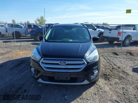 2018 Ford Escape SE z VIN 1FMCU9GD5JUB15259, wystawiony jako IAAI lot #42182040 z przebiegiem 122 194 mil mil oraz . Historia ofert i sprzedaży dostępna na DreamBid. Obrazek 13.