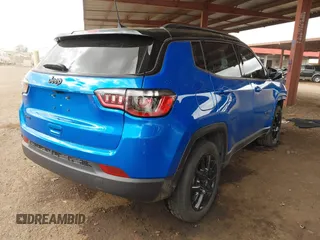 2023 Jeep Compass Latitude with VIN 3C4NJDBN7PT513648, listed as a IAAI auction lot 41711097 with 8,580 mi miles and . Bid and sale history available at DreamBid. Image 4.