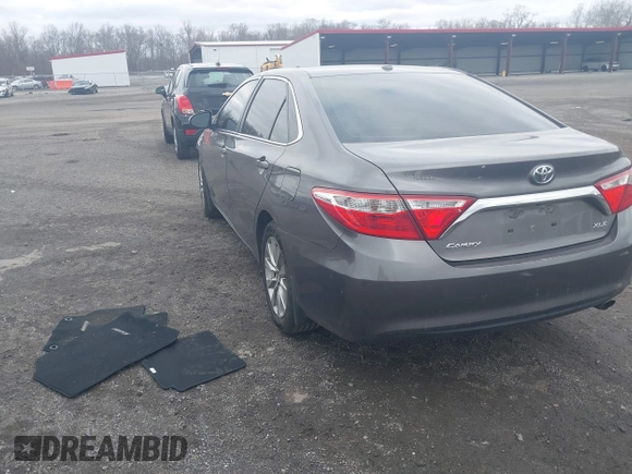 2015 Toyota Camry XLE with VIN 4T1BF1FKXFU936775, listed as a IAAI auction lot 41807486 with 97,148 mi miles and . Bid and sale history available at DreamBid. Image 3.