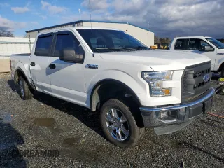 2015 Ford F-150 XLT with VIN 1FTEW1EF4FFC63153, listed as a Copart auction lot 87228144 with 105,160 mi miles and Salvage Title. Bid and sale history available at carsss.com. Image 4.