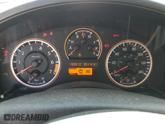 2014 Nissan Titan SV with VIN 1N6BA0ED0EN517002, listed as a Copart auction lot 57885435 with 139,910 mi miles and Salvage title. Bid and sale history available at DreamBid. Image 9.