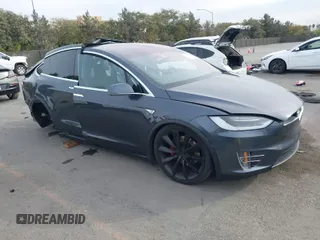 2016 Tesla Model X 70D with VIN 5YJXCAE27GF015175, listed as a IAAI auction lot 41074929 with 115,130 mi miles. Bid and sale history available at carsss.com. Image 1.