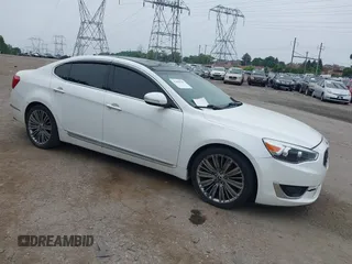 2014 Kia Cadenza Premium z VIN KNALN4D77E5159330, wystawiony jako IAAI lot #42498709 z przebiegiem 108 727 mil mil oraz . Historia ofert i sprzedaży dostępna na DreamBid. Obrazek 1.