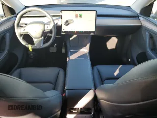 2024 Tesla Model Y Long Range с VIN 7SAYGDEE3RA236473, выставлен на аукционе Copart как лот 77409334 с пробегом 5 822 миль миль и Списание • Salvage title. История ставок и продаж доступна на DreamBid. Изображение 8.