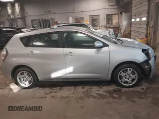 2009 Pontiac Vibe with VIN 5Y2SM67009Z422428, listed as a IAAI auction lot 41356815 with 63,924 mi miles. Bid and sale history available at carsss.com. Image 13.
