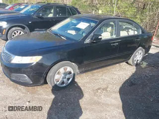 2010 Kia Optima LX with VIN KNAGG4A86A5391811, listed as a IAAI auction lot 41928441 with 152,385 mi miles. Bid and sale history available at carsss.com. Image 2.