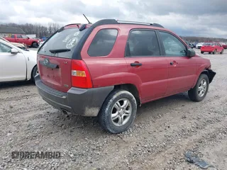 2006 Kia Sportage LX z VIN KNDJF723367282007, wystawiony jako IAAI lot #41214330 z przebiegiem 168 793 mil mil oraz . Historia ofert i sprzedaży dostępna na DreamBid. Obrazek 4.