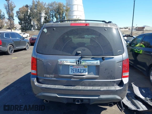 2014 Honda Pilot EX-L with VIN 5FNYF3H52EB015806, listed as a IAAI auction lot 41676586 with 193,215 mi miles and . Bid and sale history available at carsss.com. Image 17.