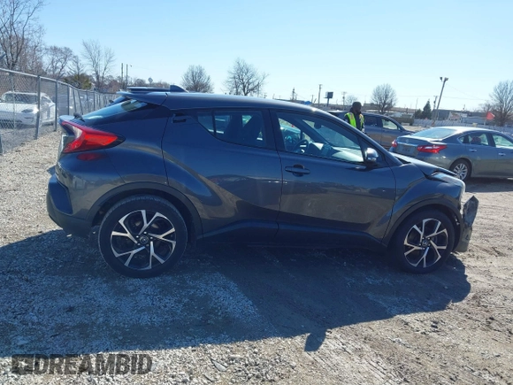 2018 Toyota C-HR XLE z VIN NMTKHMBX5JR042941, wystawiony jako IAAI lot #41803153 z przebiegiem 110 220 mil mil oraz . Historia ofert i sprzedaży dostępna na DreamBid. Obrazek 13.