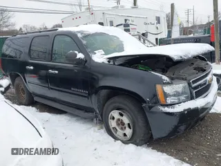 2010 Chevrolet Suburban LS with VIN 1GNUKHE37AR203811, listed as a IAAI auction lot 41304431 with 999,999 mi miles. Bid and sale history available at carsss.com. Image 1.