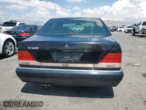 1995 Mercedes-Benz S with VIN WDBGA51E9SA239416, listed as a Copart auction lot 56059905 with 186,286 mi miles and Clean Title. Bid and sale history available at DreamBid. Image 6.