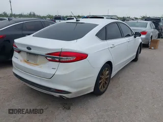 2017 Ford Fusion SE with VIN 3FA6P0H79HR149533, listed as a IAAI auction lot 41886152 with 119,049 mi miles. Bid and sale history available at carsss.com. Image 4.
