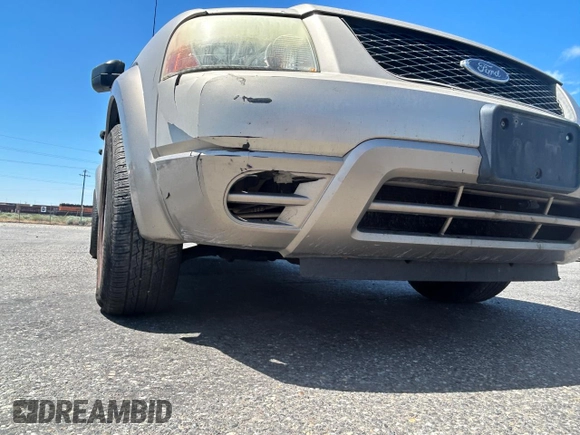 2005 Ford Freestyle SE with VIN 1FMZK01195GA75914, listed as a Copart auction lot 62560335 with Not provided miles and Salvage title. Bid and sale history available at DreamBid. Image 13.