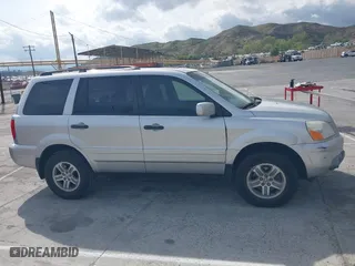 2005 Honda Pilot EX-L with NAVI with VIN 2HKYF18755H552502, listed as a IAAI auction lot 41921122 with 187,904 mi miles. Bid and sale history available at carsss.com. Image 13.