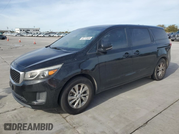 2015 Kia Sedona L with VIN KNDMA5C11F6048368, listed as a Copart auction lot 83772534 with 140,896 mi miles and Clean Title. Bid and sale history available at carsss.com. Image 1.