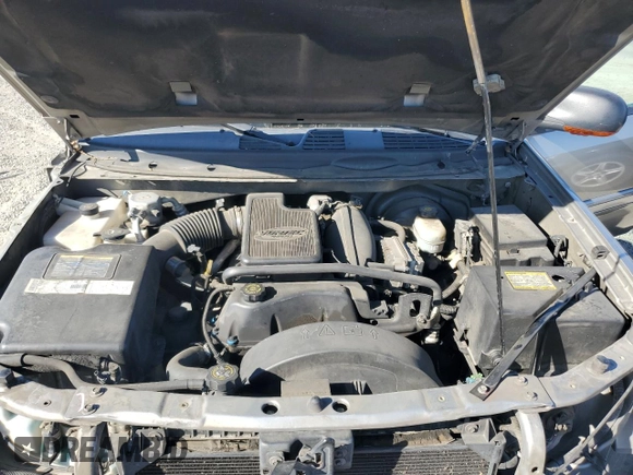 2002 GMC Envoy SLE z VIN 1GKDS13S822359901, wystawiony jako Copart lot #71940774 z przebiegiem 188 580 mil mil oraz Szkoda całkowita • Salvage title. Historia ofert i sprzedaży dostępna na DreamBid. Obrazek 11.