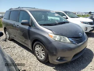 2011 Toyota Sienna XLE AAS with VIN 5TDYK3DCXBS134341, listed as a Copart auction lot 61602705 with 184,959 mi miles and Clean title. Bid and sale history available at DreamBid. Image 4.