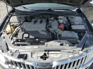 2012 Lincoln MKZ z VIN 3LNHL2JC9CR823251, wystawiony jako Copart lot #57848645 z przebiegiem 237 274 mil mil oraz Szkoda całkowita • Salvage title. Historia ofert i sprzedaży dostępna na DreamBid. Obrazek 11.