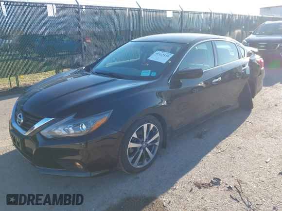 2016 Nissan Altima SR with VIN 1N4AL3AP7GC212210, listed as a IAAI auction lot 41923139 with 26,433 mi miles and . Bid and sale history available at carsss.com. Image 2.