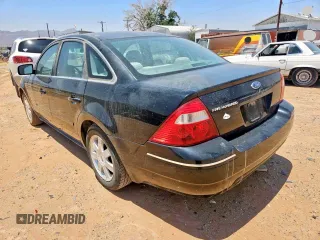 2005 Ford Five Hundred SE z VIN 1FAFP23135G155457, wystawiony jako Copart lot #59118245 z przebiegiem 157 582 mil mil oraz Tytuł czysty. Historia ofert i sprzedaży dostępna na DreamBid. Obrazek 3.
