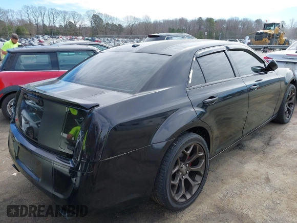 2013 Chrysler 300 C with VIN 2C3CCAKT6DH712441, listed as a IAAI auction lot 41695261 with 182,314 mi miles and . Bid and sale history available at carsss.com. Image 4.