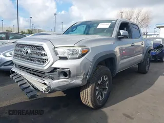 2017 Toyota Tacoma SR5 with VIN 3TMAZ5CN4HM050262, listed as a IAAI auction lot 41891983 with 140,692 mi miles and . Bid and sale history available at DreamBid. Image 2.