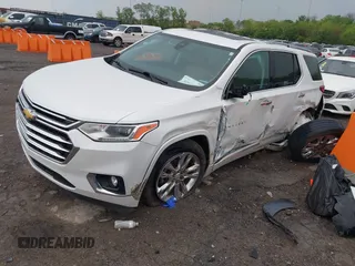 2018 Chevrolet Traverse High Country with VIN 1GNEVKKW4JJ133786, listed as a IAAI auction lot 42076685 with 167,787 mi miles and . Bid and sale history available at DreamBid. Image 2.