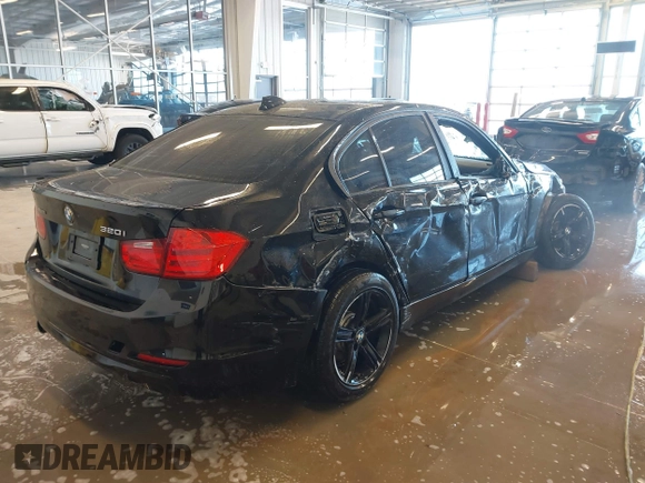 2015 BMW 3 Series 320i xDrive with VIN WBA3C3C56FK203031, listed as a IAAI auction lot 41012182 with 83,611 mi miles and . Bid and sale history available at DreamBid. Image 4.