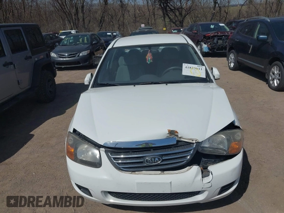 2009 Kia Spectra EX with VIN KNAFE221X95624138, listed as a IAAI auction lot 41823611 with 136,790 mi miles. Bid and sale history available at carsss.com. Image 6.