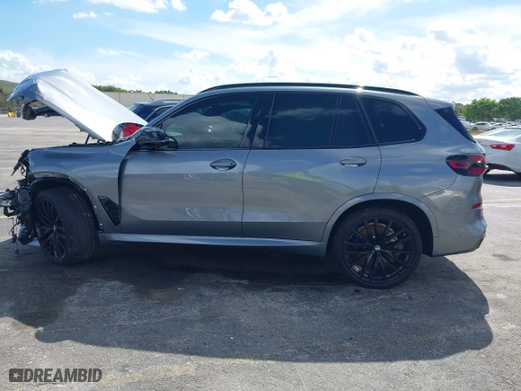 2025 BMW X5 M60i with VIN 5UX33EU03S9X62019, listed as a IAAI auction lot 41623189 with 5,749 mi miles. Bid and sale history available at carsss.com. Image 14.