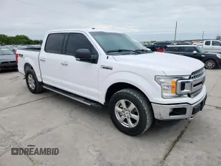 2018 Ford F-150 XL with VIN 1FTEW1E54JKC36073, listed as a Copart auction lot 63433085 with 136,844 mi miles and Clean title. Bid and sale history available at DreamBid. Image 4.