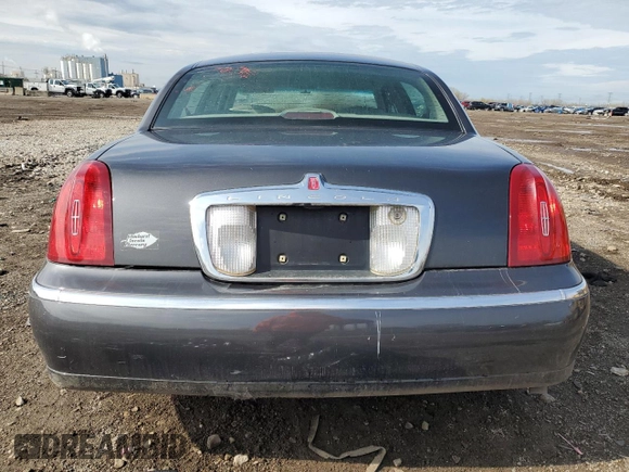 1999 Lincoln Town Car Executive z VIN 1LNHM81W0XY644873, wystawiony jako Copart lot #52865095 z przebiegiem Nie podano mil oraz Szkoda całkowita • Salvage title. Historia ofert i sprzedaży dostępna na DreamBid. Obrazek 6.