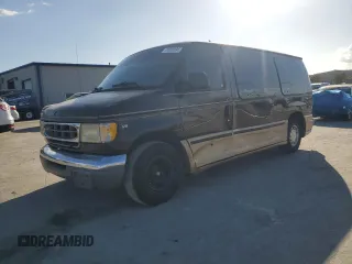 2000 Ford Econoline Cargo with VIN 1FDRE14W9YHA11634, listed as a Copart auction lot 77000094 with 217,831 mi miles and Salvage Title. Bid and sale history available at carsss.com. Image 1.