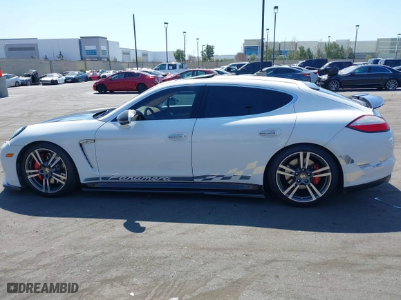 2011 Porsche Panamera Turbo with VIN WP0AC2A7XBL091024, listed as a IAAI auction lot 41841471 with 64,722 mi miles. Bid and sale history available at carsss.com. Image 14.