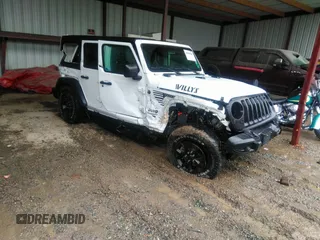 2021 Jeep Wrangler Unlimited Willys with VIN 1C4HJXDN6MW616741, listed as a IAAI auction lot 42009965 with 38,451 mi miles and . Bid and sale history available at DreamBid. Image 1.