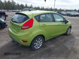 2011 Ford Fiesta SE with VIN 3FADP4EJ6BM150660, listed as a IAAI auction lot 41953032 with 175,607 mi miles. Bid and sale history available at carsss.com. Image 4.