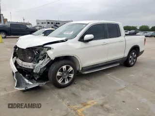 2017 Honda Ridgeline RTL-T with VIN 5FPYK2F63HB009073, listed as a Copart auction lot 54648635 with 72,029 mi miles and Salvage title. Bid and sale history available at DreamBid. Image 1.