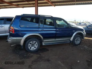 2001 Mitsubishi Montero Sport LS with VIN JA4MT31H71P007335, listed as a IAAI auction lot 41465825 with 258,707 mi miles. Bid and sale history available at carsss.com. Image 13.