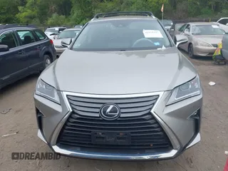 2018 Lexus RX 350 z VIN 2T2BZMCA4JC157690, wystawiony jako IAAI lot #42155397 z przebiegiem 104 075 mil mil oraz . Historia ofert i sprzedaży dostępna na DreamBid. Obrazek 13.